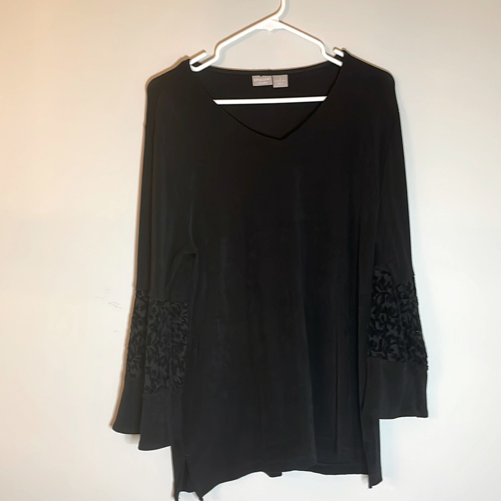 Chicos travelers black long sleeve. Flare sleeve with floral detail.